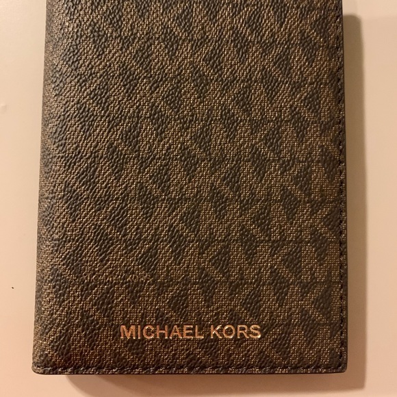 Michael Kors Handbags - Michael Kors passport wallet